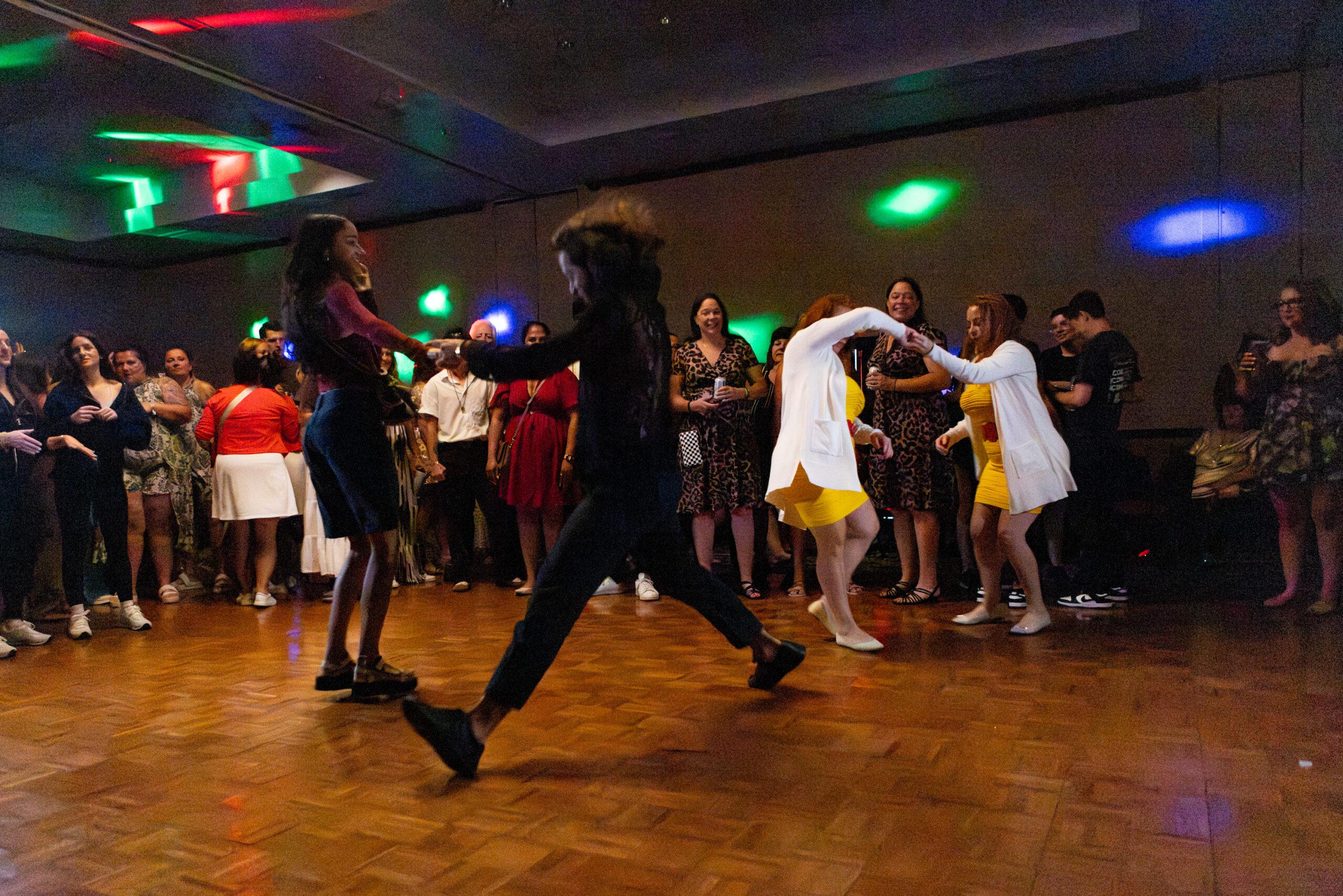 Twins dance at a hotel party in Twinsburg.